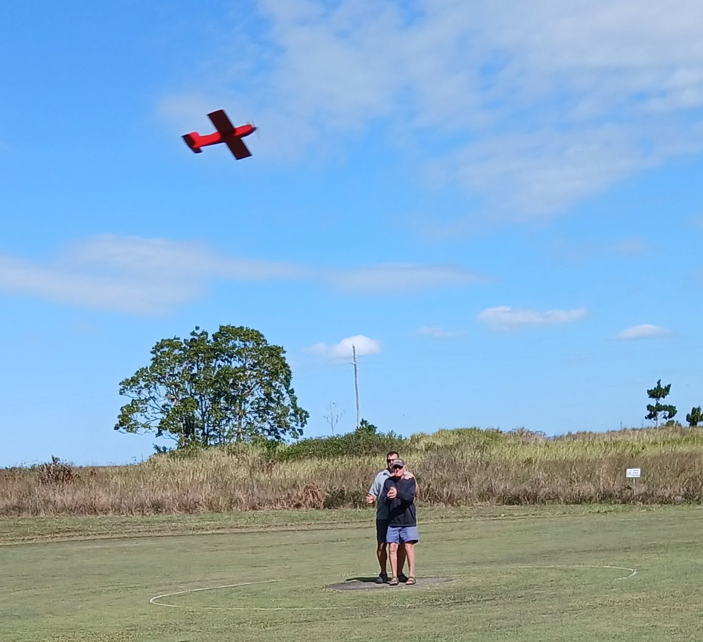 Red Control Line Plane Flying in Circle